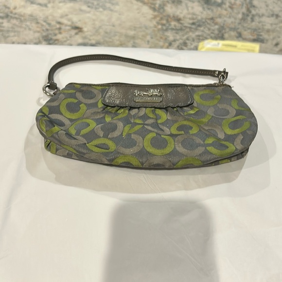 Coach Handbags - ￼ Coach satine green mini bag or wristlet 9” x 5” zipper closure in her pocket